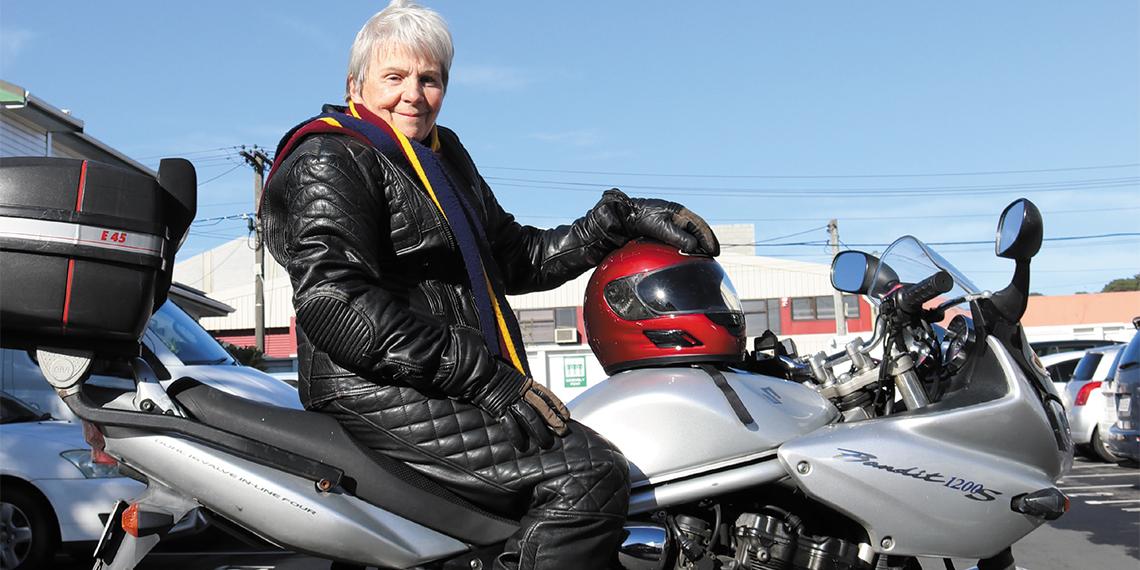 Major Judith Bennett on a motorbike