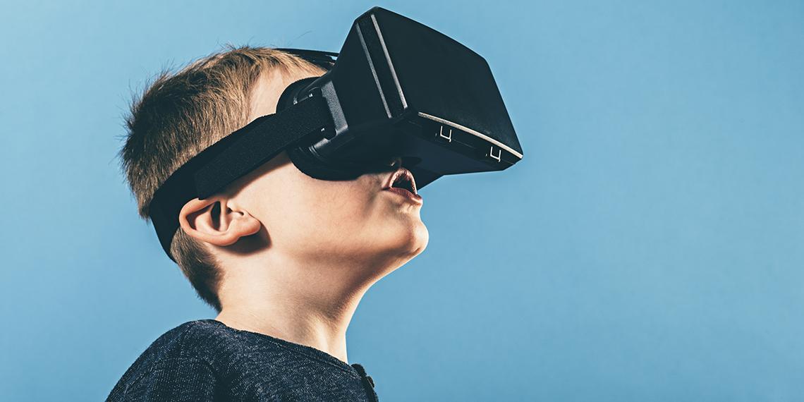 a boy wearing a VR headset